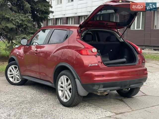 Червоний Ніссан Жук, об'ємом двигуна 1.62 л та пробігом 188 тис. км за 10500 $, фото 7 на Automoto.ua