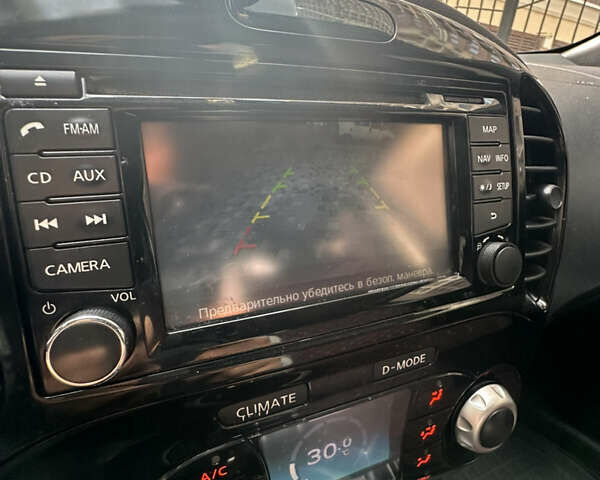 Красный Ниссан Жук, объемом двигателя 1.6 л и пробегом 102 тыс. км за 9200 $, фото 23 на Automoto.ua