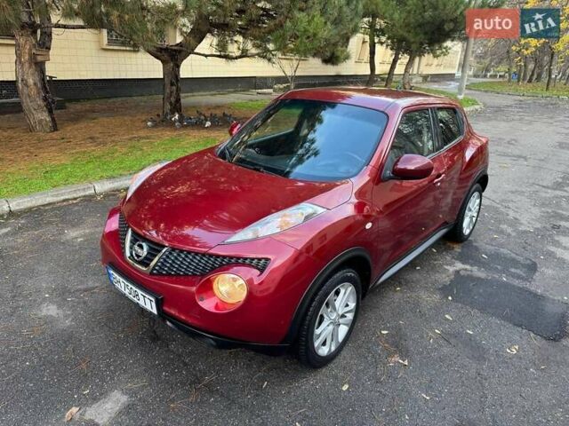 Красный Ниссан Жук, объемом двигателя 1.6 л и пробегом 170 тыс. км за 10300 $, фото 1 на Automoto.ua