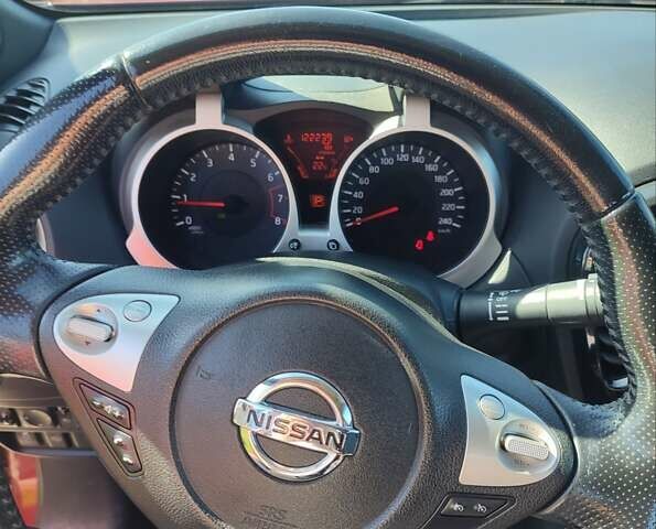 Червоний Ніссан Жук, об'ємом двигуна 1.6 л та пробігом 122 тис. км за 10200 $, фото 15 на Automoto.ua