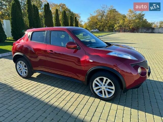 Красный Ниссан Жук, объемом двигателя 1.6 л и пробегом 170 тыс. км за 9700 $, фото 5 на Automoto.ua