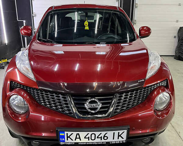 Червоний Ніссан Жук, об'ємом двигуна 1.6 л та пробігом 120 тис. км за 10000 $, фото 2 на Automoto.ua