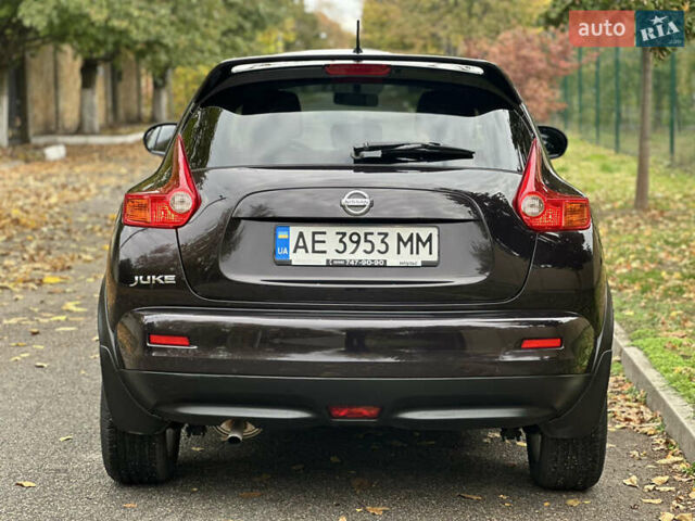 Ниссан Жук 2013 в Днепре (Днепропетровске) на Automoto.ua Красный Ниссан Жук, объемом двигателя 1.6 л и пробегом 116 тыс. км за 12000 $, фото 8 на Automoto.ua