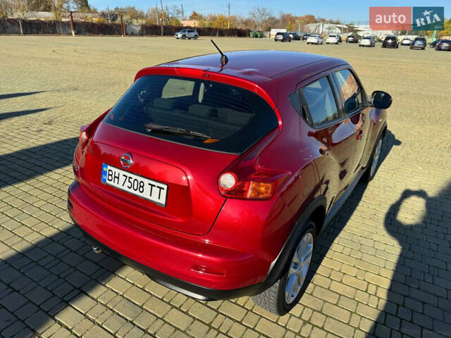 Красный Ниссан Жук, объемом двигателя 1.6 л и пробегом 169 тыс. км за 9800 $, фото 13 на Automoto.ua