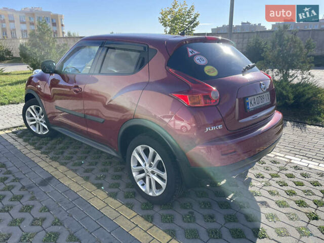 Червоний Ніссан Жук, об'ємом двигуна 1.6 л та пробігом 94 тис. км за 11500 $, фото 9 на Automoto.ua