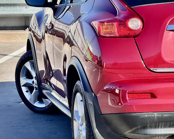 Красный Ниссан Жук, объемом двигателя 1.6 л и пробегом 54 тыс. км за 11500 $, фото 13 на Automoto.ua