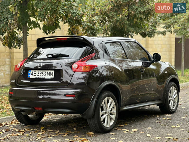 Ниссан Жук 2013 в Днепре (Днепропетровске) на Automoto.ua Красный Ниссан Жук, объемом двигателя 1.6 л и пробегом 116 тыс. км за 12000 $, фото 7 на Automoto.ua