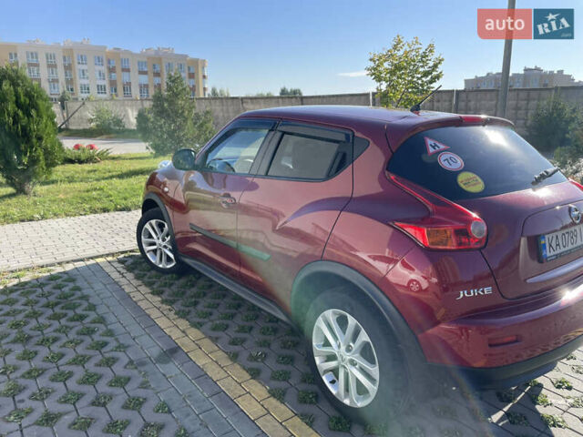 Червоний Ніссан Жук, об'ємом двигуна 1.6 л та пробігом 94 тис. км за 11500 $, фото 3 на Automoto.ua