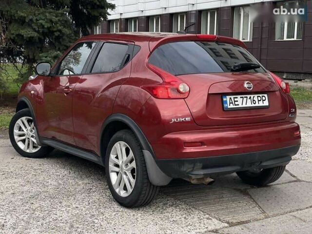 Красный Ниссан Жук, объемом двигателя 1.6 л и пробегом 188 тыс. км за 10500 $, фото 5 на Automoto.ua