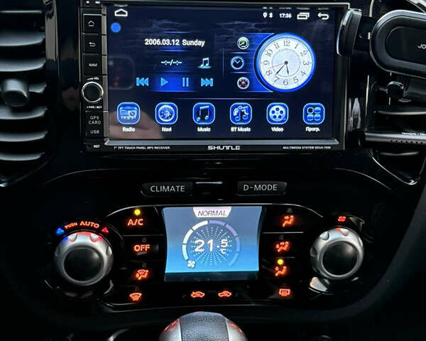 Червоний Ніссан Жук, об'ємом двигуна 1.6 л та пробігом 54 тис. км за 11800 $, фото 15 на Automoto.ua