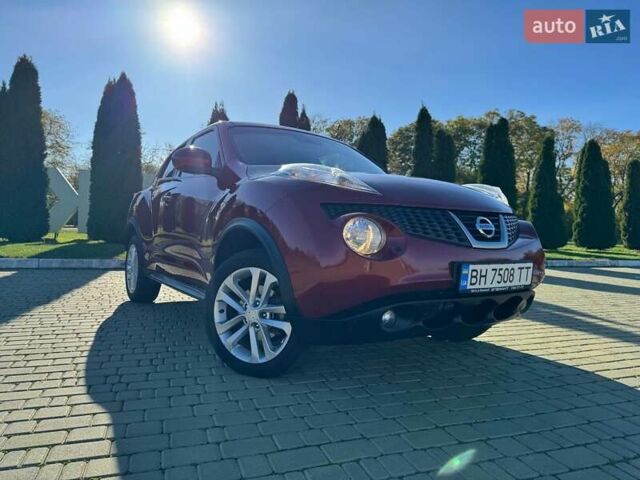Красный Ниссан Жук, объемом двигателя 1.6 л и пробегом 170 тыс. км за 9700 $, фото 1 на Automoto.ua