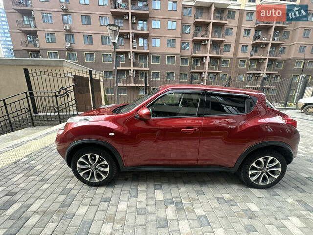 Красный Ниссан Жук, объемом двигателя 1.6 л и пробегом 102 тыс. км за 9200 $, фото 20 на Automoto.ua