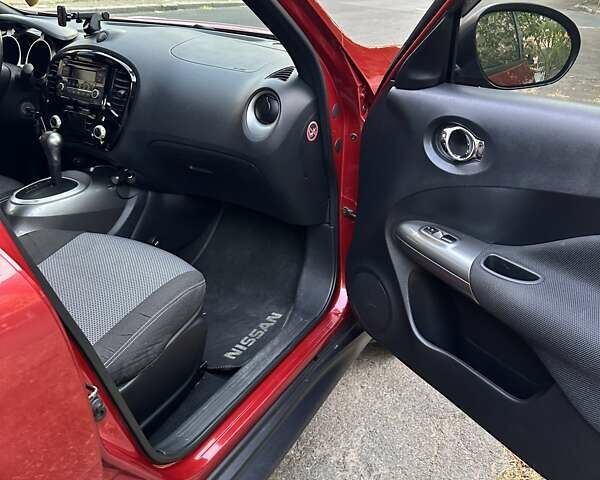 Червоний Ніссан Жук, об'ємом двигуна 1.6 л та пробігом 67 тис. км за 12300 $, фото 9 на Automoto.ua