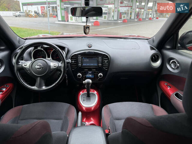 Червоний Ніссан Жук, об'ємом двигуна 1.6 л та пробігом 151 тис. км за 9900 $, фото 22 на Automoto.ua