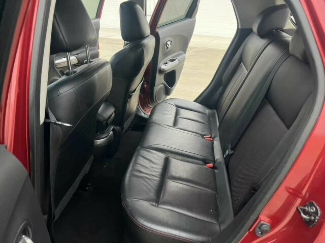 Червоний Ніссан Жук, об'ємом двигуна 1.6 л та пробігом 80 тис. км за 12600 $, фото 11 на Automoto.ua