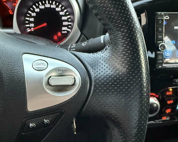 Червоний Ніссан Жук, об'ємом двигуна 1.6 л та пробігом 54 тис. км за 11800 $, фото 18 на Automoto.ua