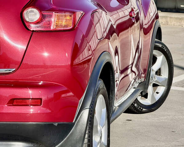 Красный Ниссан Жук, объемом двигателя 1.6 л и пробегом 54 тыс. км за 11500 $, фото 17 на Automoto.ua