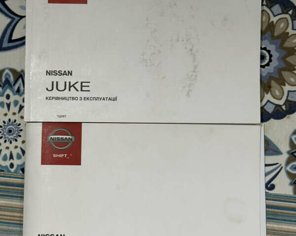 Червоний Ніссан Жук, об'ємом двигуна 1.6 л та пробігом 54 тис. км за 11800 $, фото 26 на Automoto.ua