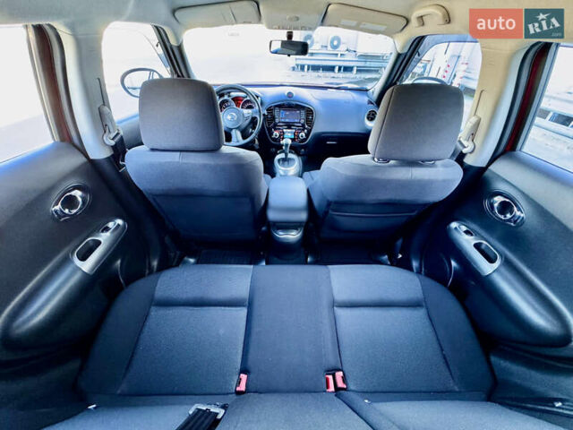 Красный Ниссан Жук, объемом двигателя 1.6 л и пробегом 54 тыс. км за 11500 $, фото 30 на Automoto.ua