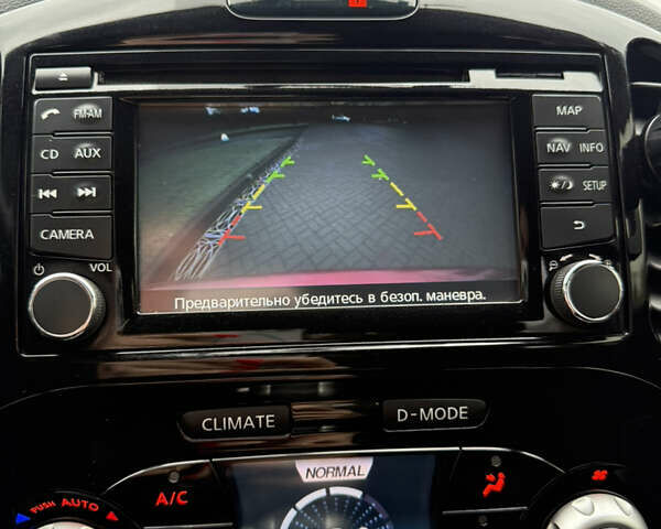 Червоний Ніссан Жук, об'ємом двигуна 1.6 л та пробігом 151 тис. км за 9900 $, фото 25 на Automoto.ua