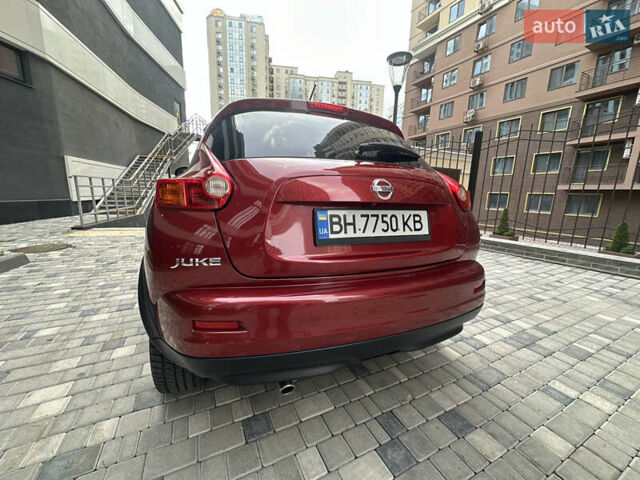 Красный Ниссан Жук, объемом двигателя 1.6 л и пробегом 102 тыс. км за 9200 $, фото 4 на Automoto.ua