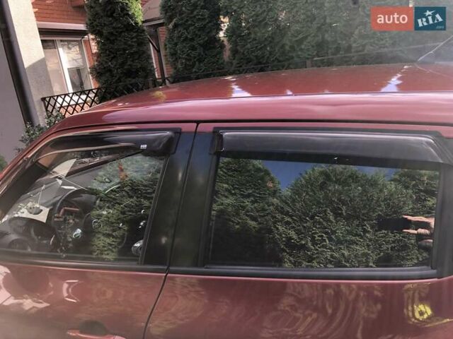 Красный Ниссан Жук, объемом двигателя 1.6 л и пробегом 131 тыс. км за 12600 $, фото 2 на Automoto.ua