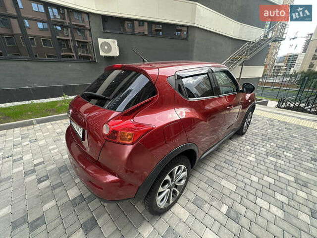 Красный Ниссан Жук, объемом двигателя 1.6 л и пробегом 102 тыс. км за 9200 $, фото 5 на Automoto.ua