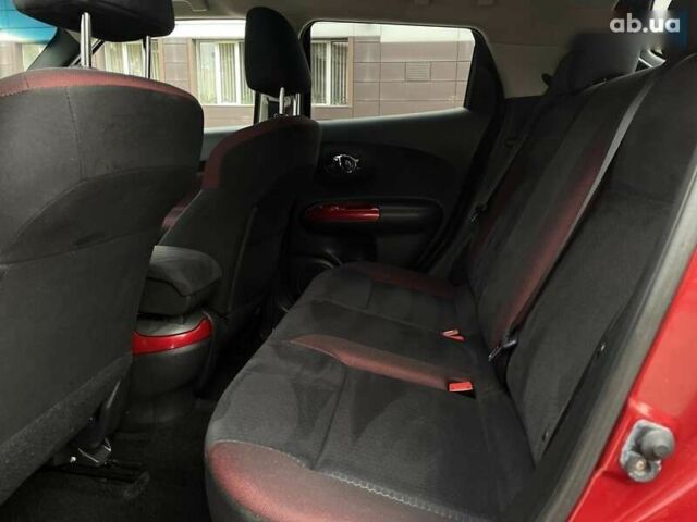 Красный Ниссан Жук, объемом двигателя 1.6 л и пробегом 188 тыс. км за 10500 $, фото 19 на Automoto.ua