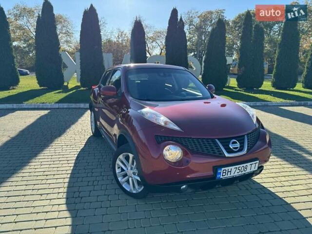 Красный Ниссан Жук, объемом двигателя 1.6 л и пробегом 170 тыс. км за 9700 $, фото 2 на Automoto.ua