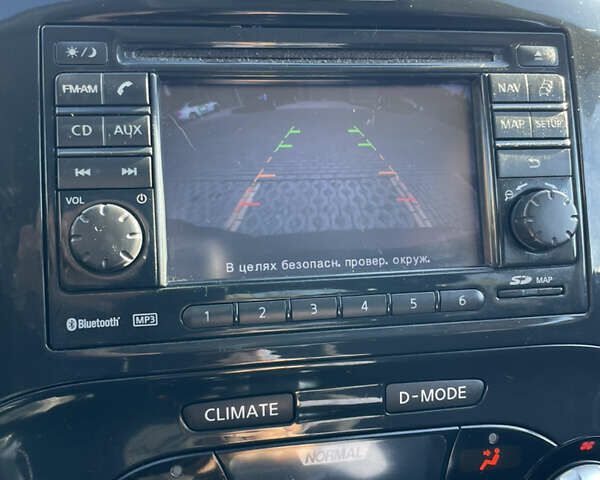 Червоний Ніссан Жук, об'ємом двигуна 1.6 л та пробігом 94 тис. км за 11500 $, фото 1 на Automoto.ua