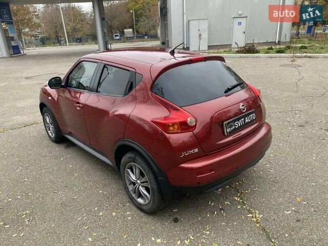 Красный Ниссан Жук, объемом двигателя 1.6 л и пробегом 56 тыс. км за 12200 $, фото 16 на Automoto.ua