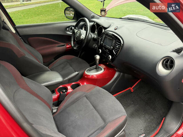 Червоний Ніссан Жук, об'ємом двигуна 1.6 л та пробігом 151 тис. км за 9900 $, фото 17 на Automoto.ua