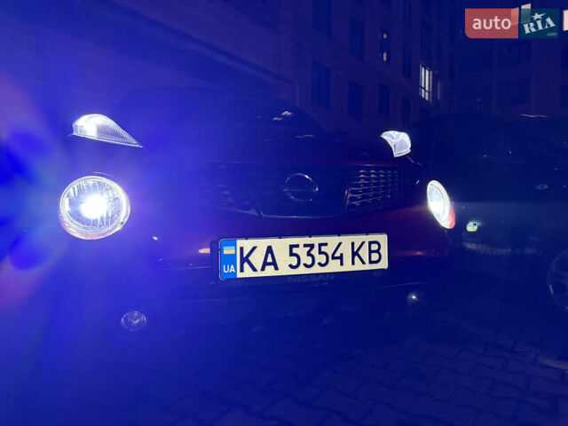 Червоний Ніссан Жук, об'ємом двигуна 1.6 л та пробігом 151 тис. км за 9900 $, фото 26 на Automoto.ua