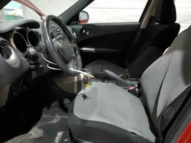 Красный Ниссан Жук, объемом двигателя 1.6 л и пробегом 45 тыс. км за 600 $, фото 6 на Automoto.ua