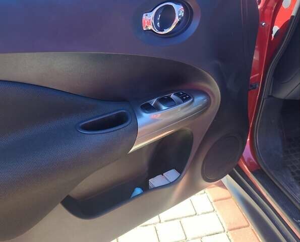 Червоний Ніссан Жук, об'ємом двигуна 1.6 л та пробігом 122 тис. км за 10200 $, фото 14 на Automoto.ua