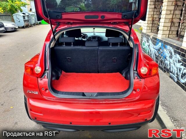 Красный Ниссан Жук, объемом двигателя 1.6 л и пробегом 130 тыс. км за 10700 $, фото 8 на Automoto.ua