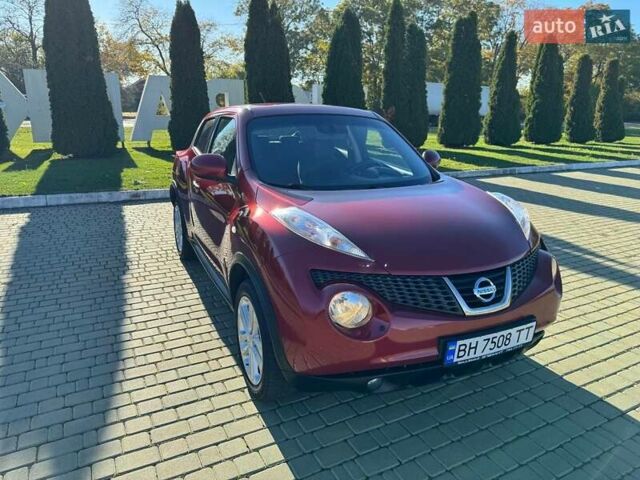 Красный Ниссан Жук, объемом двигателя 1.6 л и пробегом 170 тыс. км за 9700 $, фото 3 на Automoto.ua