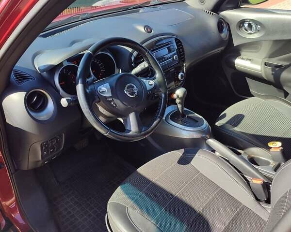 Червоний Ніссан Жук, об'ємом двигуна 1.6 л та пробігом 122 тис. км за 10200 $, фото 13 на Automoto.ua