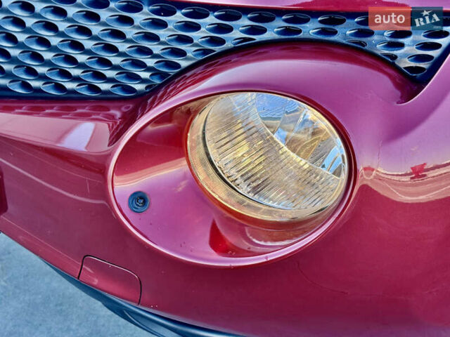 Красный Ниссан Жук, объемом двигателя 1.6 л и пробегом 54 тыс. км за 11500 $, фото 5 на Automoto.ua