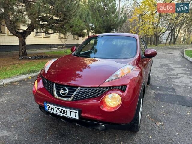 Красный Ниссан Жук, объемом двигателя 1.6 л и пробегом 170 тыс. км за 10300 $, фото 4 на Automoto.ua