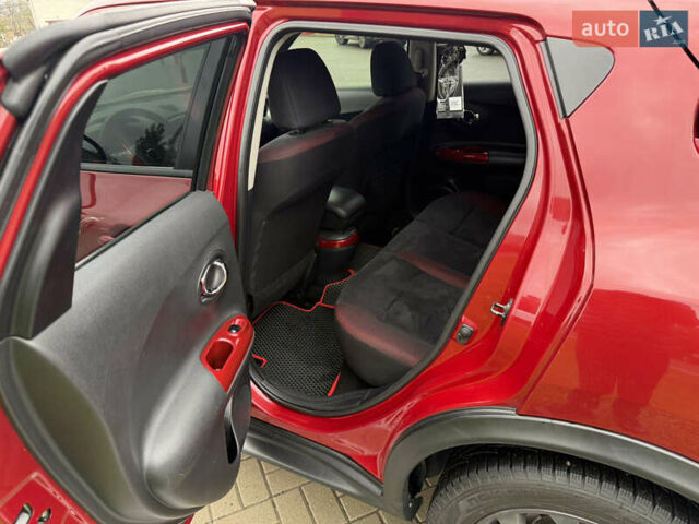 Червоний Ніссан Жук, об'ємом двигуна 1.6 л та пробігом 151 тис. км за 9900 $, фото 14 на Automoto.ua