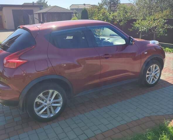 Червоний Ніссан Жук, об'ємом двигуна 1.6 л та пробігом 122 тис. км за 10200 $, фото 2 на Automoto.ua