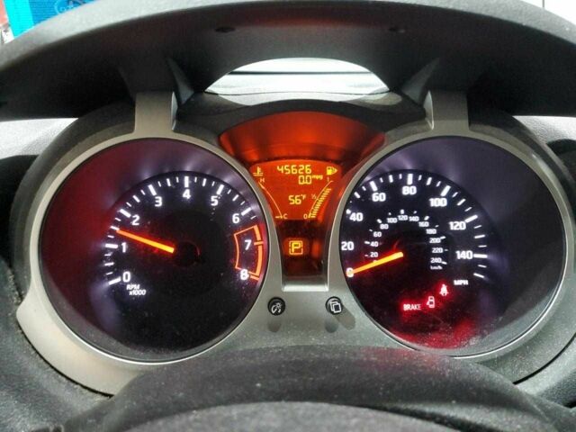 Красный Ниссан Жук, объемом двигателя 1.6 л и пробегом 45 тыс. км за 600 $, фото 8 на Automoto.ua