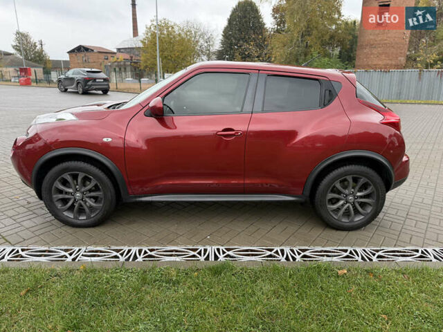 Червоний Ніссан Жук, об'ємом двигуна 1.6 л та пробігом 151 тис. км за 9900 $, фото 3 на Automoto.ua