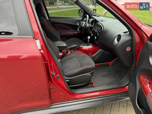 Червоний Ніссан Жук, об'ємом двигуна 1.6 л та пробігом 151 тис. км за 9900 $, фото 18 на Automoto.ua