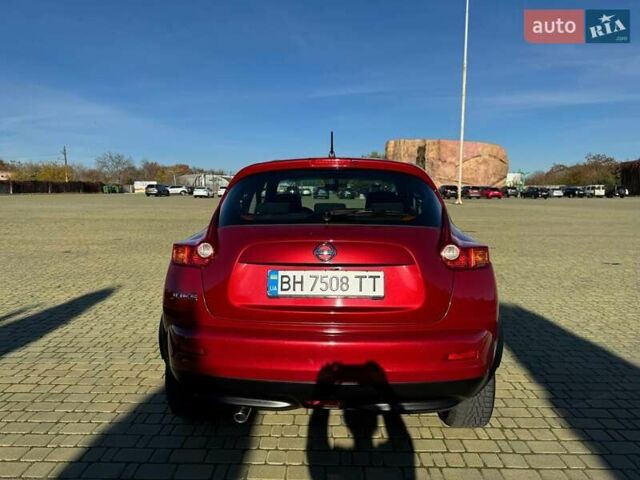 Красный Ниссан Жук, объемом двигателя 1.6 л и пробегом 170 тыс. км за 9700 $, фото 11 на Automoto.ua