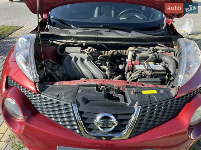 Червоний Ніссан Жук, об'ємом двигуна 1.6 л та пробігом 94 тис. км за 11500 $, фото 7 на Automoto.ua