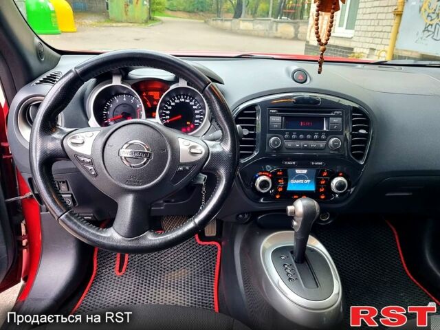 Красный Ниссан Жук, объемом двигателя 1.6 л и пробегом 130 тыс. км за 10700 $, фото 11 на Automoto.ua
