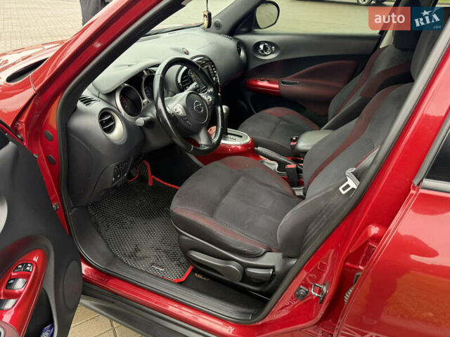 Червоний Ніссан Жук, об'ємом двигуна 1.6 л та пробігом 151 тис. км за 9900 $, фото 12 на Automoto.ua