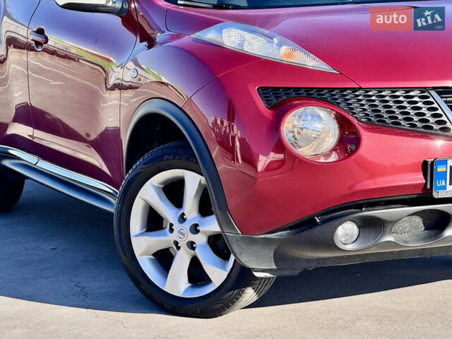 Красный Ниссан Жук, объемом двигателя 1.6 л и пробегом 54 тыс. км за 11500 $, фото 6 на Automoto.ua